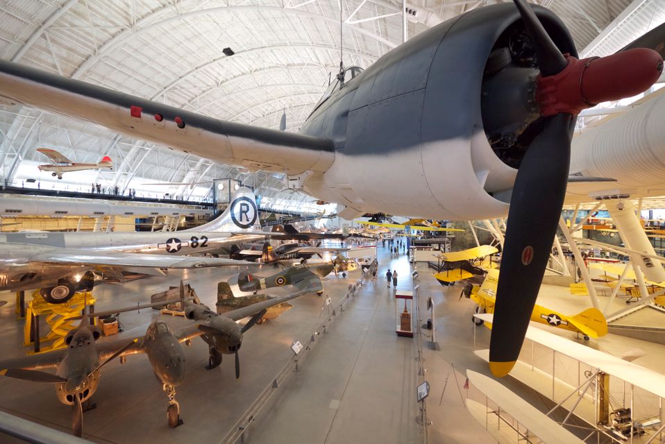 An F6F flies over.